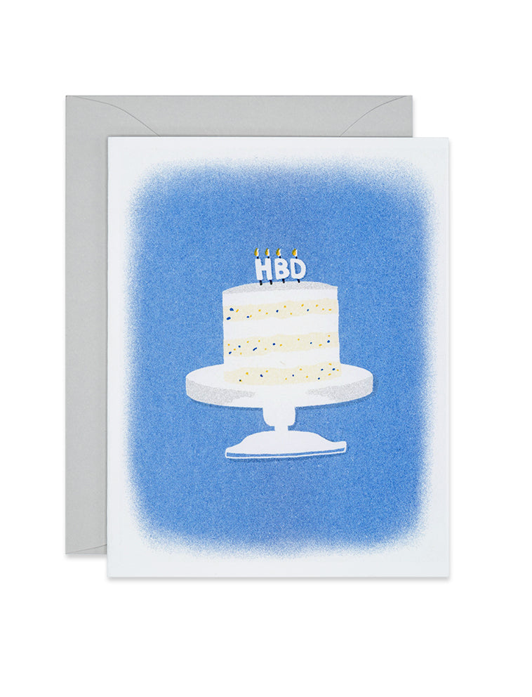 Riso Blue birthday card wit a decorated cake on a stand and HBD candles, link