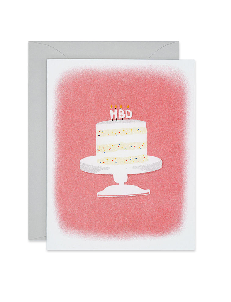 Riso red birthday card wit a decorated cake on a stand and HBD candles, link