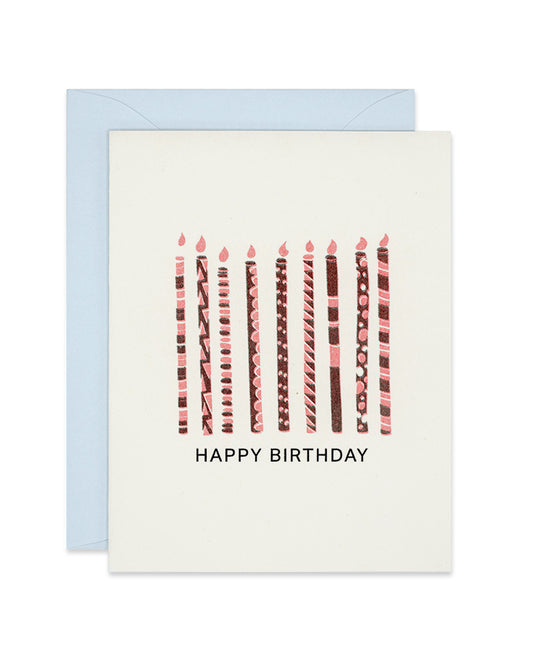 Riso birthday card with red patterned candles, link