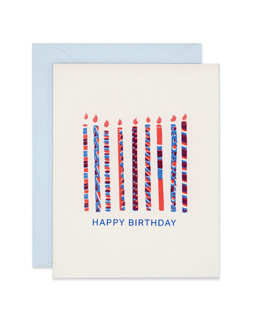 Riso birthday card with blue and red patterned candles, link
