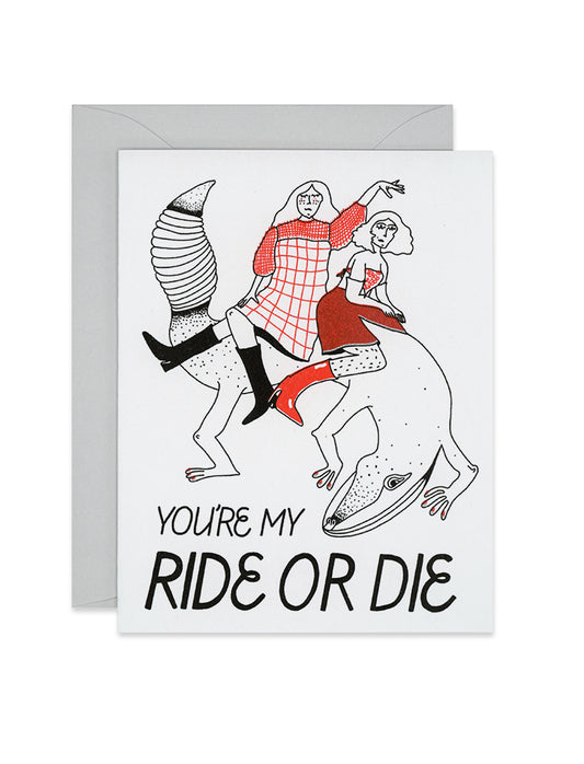 Riso friendship card with two women riding a lizard. Beneath them is printed "you're my ride or die", link
